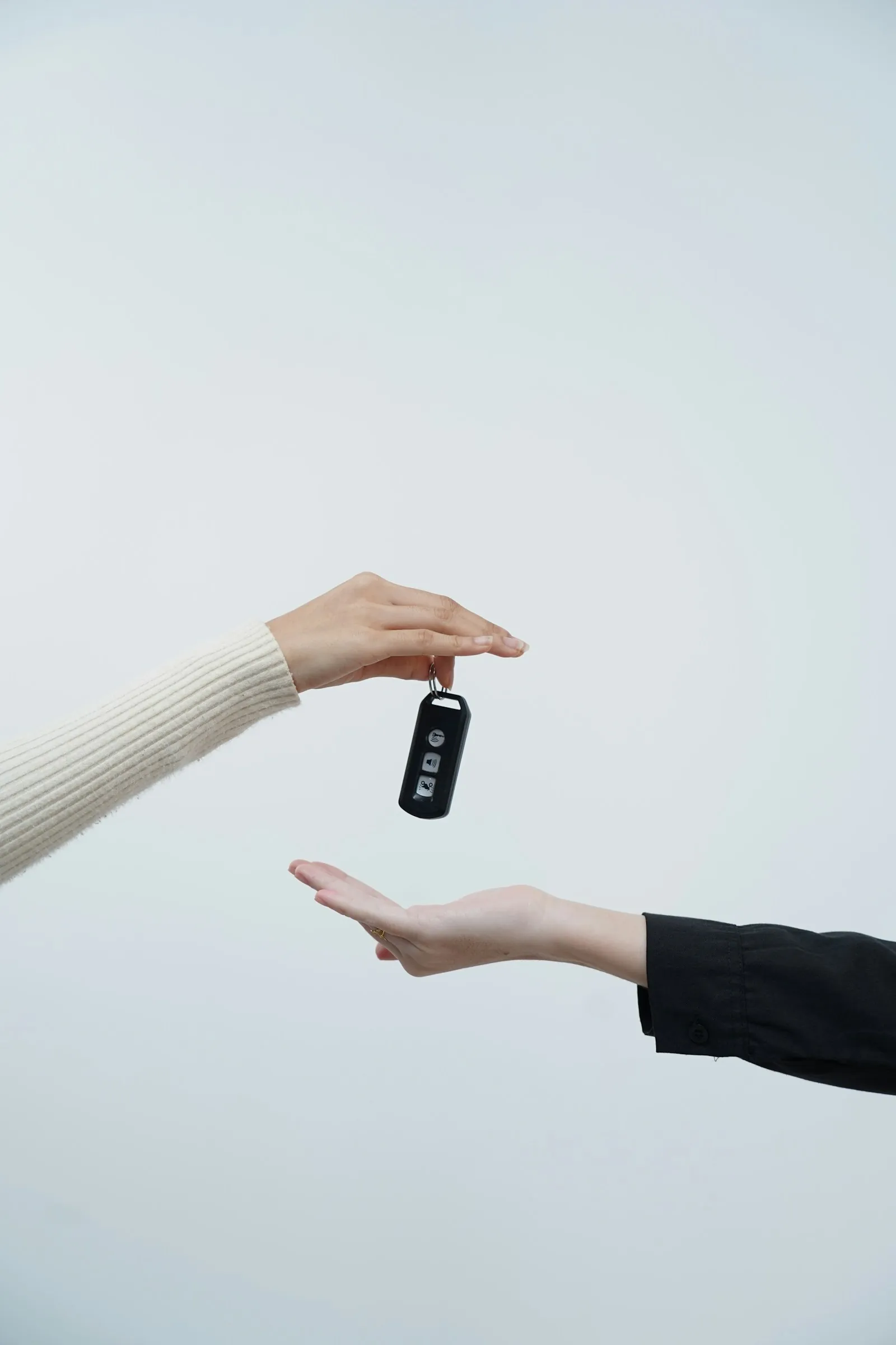 Car keys changing hands