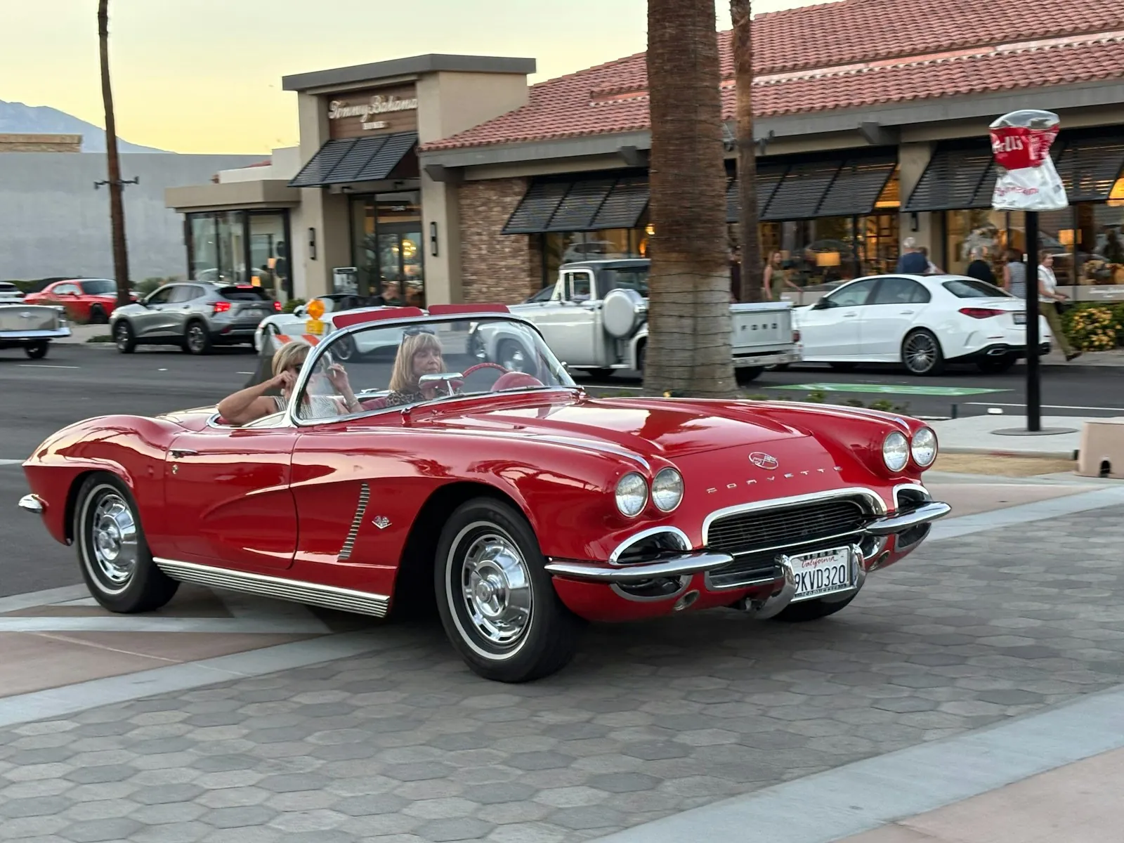 A red vintage convertible out for a drive